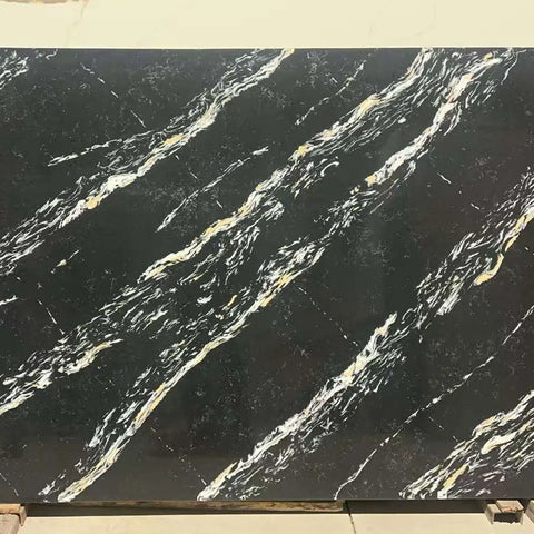 Midnight Cascade engineered stone with dramatic white and gold veining on dark charcoal background